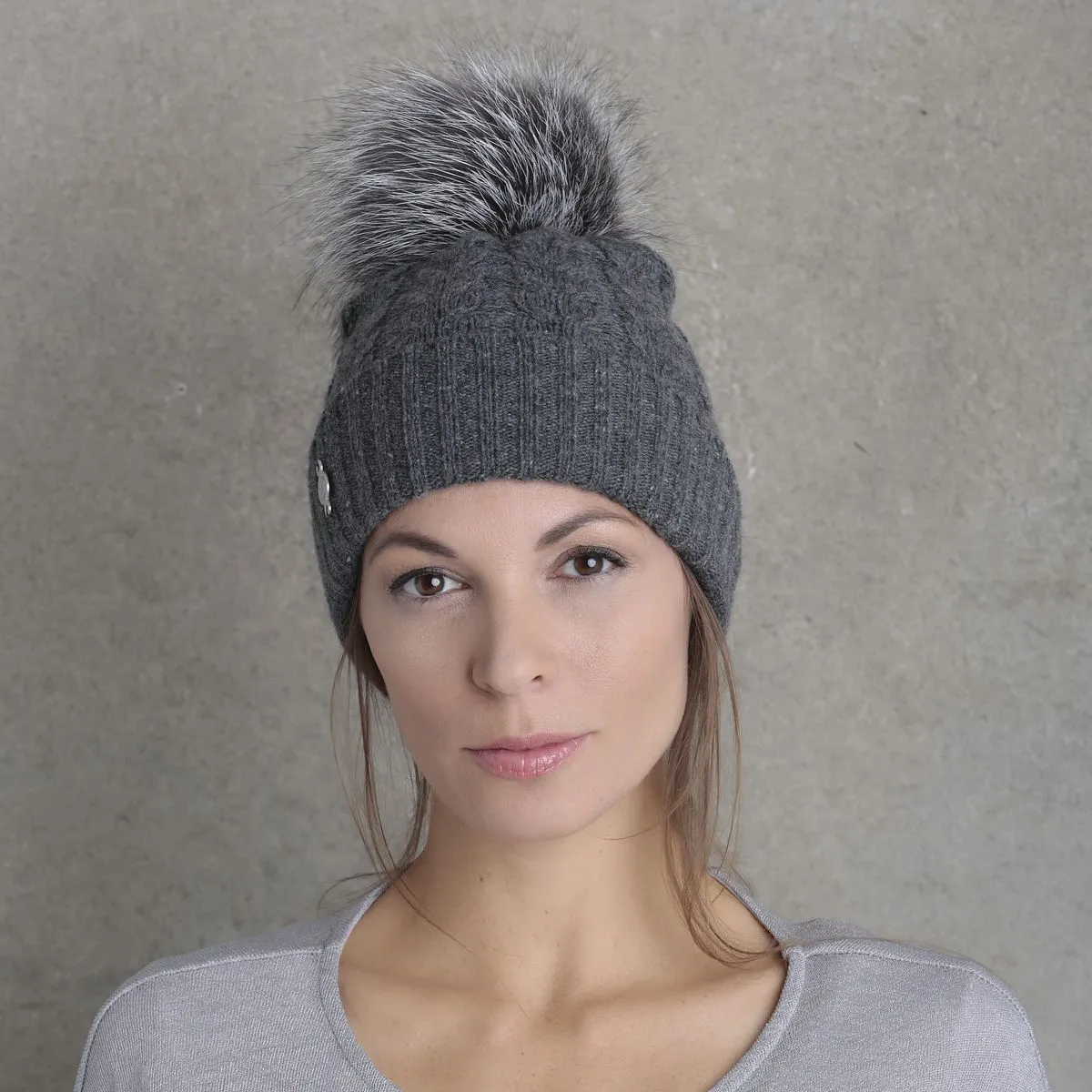 RECYCLED CASHMERE CABLE BEANIE WITH UPCYCLED FUR POM